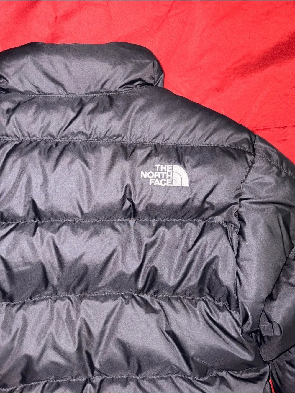 The North Face kids Black Puffer Jacket with Logo